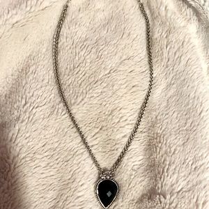 Silver costume jewelry necklace black pendant
